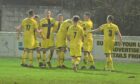The Wick players celebrate Steven Anderson's goal which put them 3-2 up against Clachnacuddin