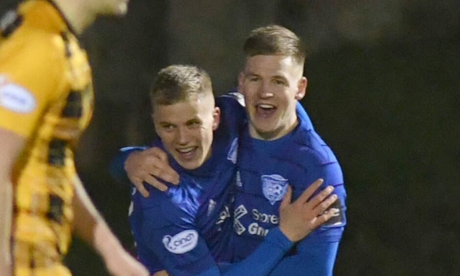 Peterhead's Ryan Duncan, left, celebrates his first senior goal with Hamish Ritchie.