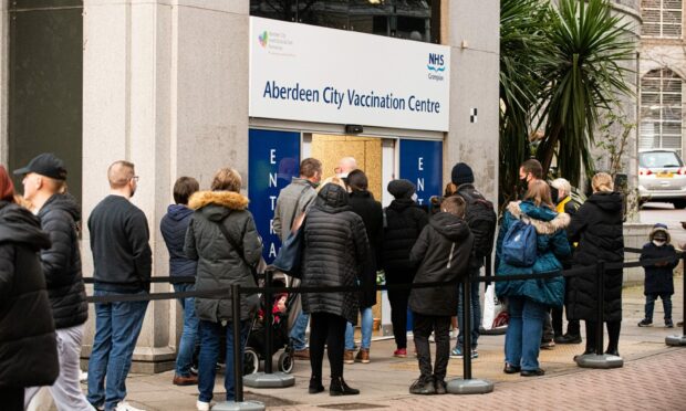 People queueing at Aberdeen's vacination centre in the premises of the old John Lewis store (Photo: Wullie Marr/DCT Media)