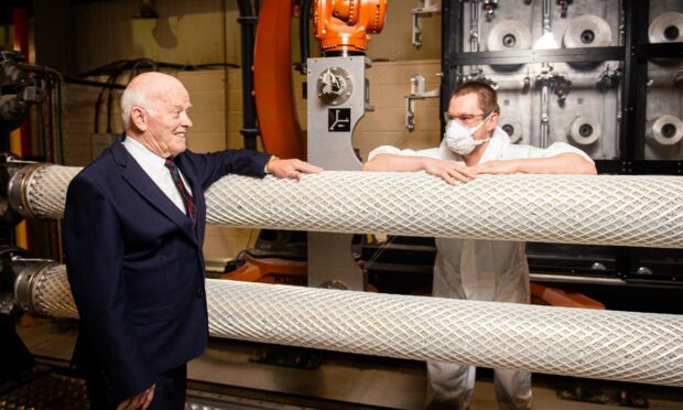 Balmoral Group chairman and managing director, Jim Milne, with Milosz Woch at the company’s cable protection system (CPS) manufacturing facility