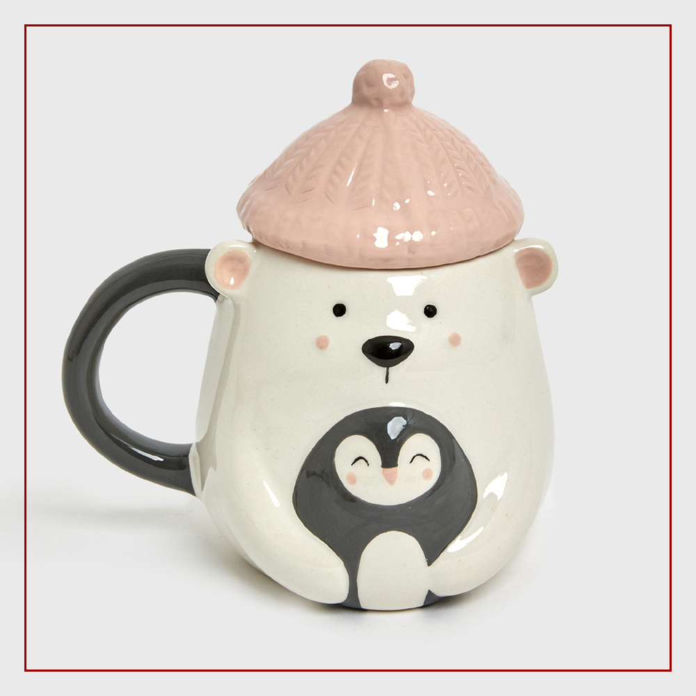 Black penguin and polar bear hot mug from New Look to prepare your home for Christmas