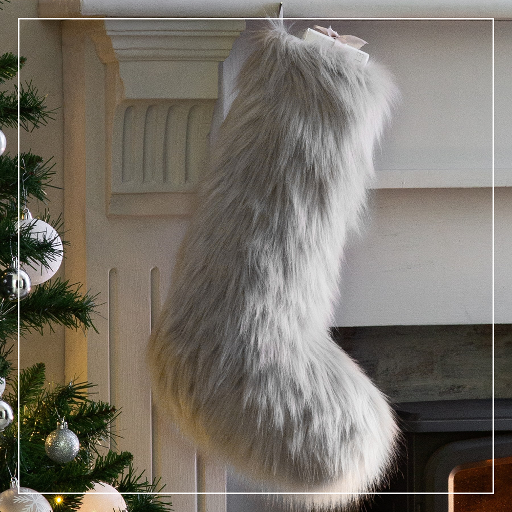 prepare your home for Christmas with Faux fur stocking from Next - £15