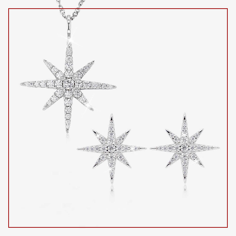 Silver star necklace and earrings set from Warren James - £38