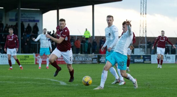 Inverness' Aaron Doran comes close with a shot against Arbroath.