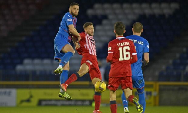 Caley Thistle came from behind to earn a point against Raith Rovers.