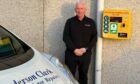 Graham Clark of Anderson Clark Motor Repairs in Inverness has fitted a defibrillator outside his building in Inverness.