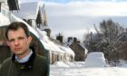 Andrew Bowie is pleading with the Scottish Government to allow Braemar residents to keep their fireplaces