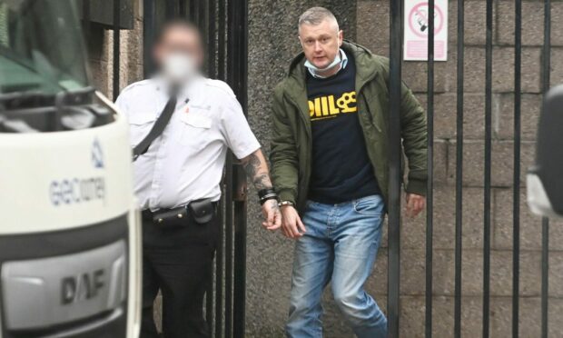 Artur Skurjat is taken to prison from Aberdeen Sheriff Court.