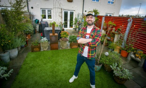 Walk on the wild side: Clarke Joss has transformed his garden to attract nature.