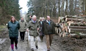 Prince Charles walks along Scots Mile with (left) Suzanna Atkinson, Visitor Services Officer, Haddo Country Park and (right) Oliver Deeming, Landscape Officer (Formartine), Aberdeenshire Council 
Picture by Kami Thomson/DC Thomson