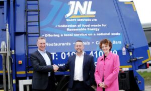 Grant Keenan, centre, of Keenan Recycling, with JNL's Jon and Natalie Lee.
