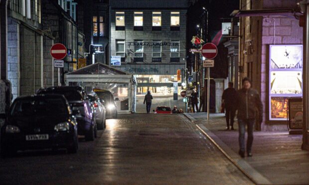 Belmont Street, popular destination for revellers in Aberdeen, was quiet after restrictions were lifted. Picture by Wullie Marr.