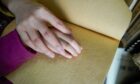 An Aberdeen man has insisted Braille is still important for people with sight loss. Photo by Xinhua/Shutterstock.
