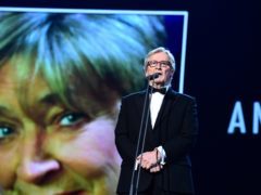 William Roache pays tribute to Anne Kirkbride on stage during the 2015 National Television Awards (Ian West/PA)