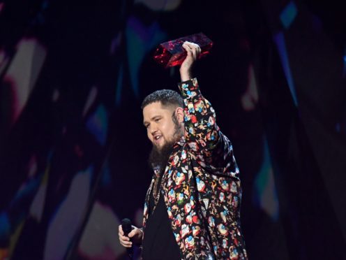 Rag ‘n’ Bone man accepts the award for Best British Single during the 2018 Brit Awards (Victoria Jones/PA)