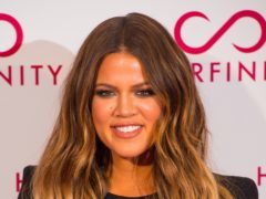 Khloe Kardashian has paid a glowing tribute to her brother, Rob. (Dominic Lipinski/PA)