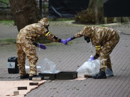 Military personnel at the site in Salisbury where Russian double agent Sergei Skripal and his daughter Yulia were found on a park bench (Ben Birchall/PA)