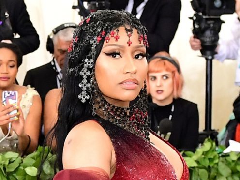 Nicki Minaj told Elle magazine that knowing she does not need to be with someone to live her life, or for her career, is empowering (Ian West/PA)