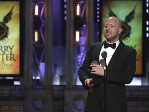 John Tiffany accepts the award for best direction of a play for Harry Potter And The Cursed Child (Michael Zorn/Invision/AP)