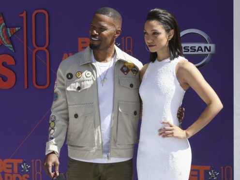 Jamie Foxx and his daughter Corinne Foxx arrive at the BET Awards at the Microsoft Theater in Los Angeles (Willy Sanjuan/Invision/AP)