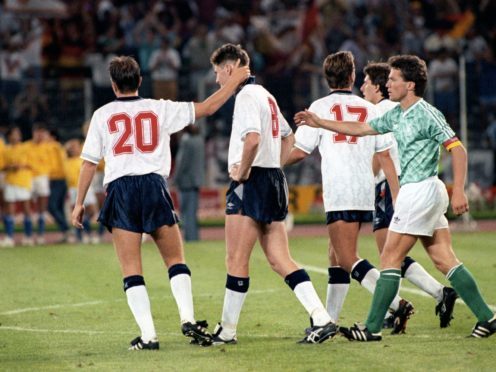 West Germany captain Lothar Mathaus (right) and England’s Gary Lineker (left) console Chris Waddle after his penalty miss during the shootout in England’s 1990 World Cup semi-final (Ross Kinnaird/EMPICS Sport/PA)
