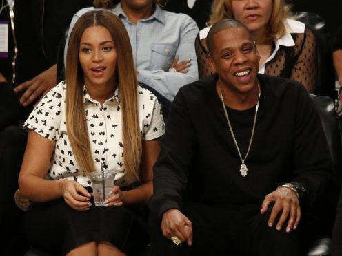 Jaz-Z and Beyonce will play the festival (Jonathan Brady/PA)