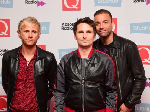 Dominic Howard, Matt Bellamy and Chris Wolstenholme of Muse (Ian West/PA)