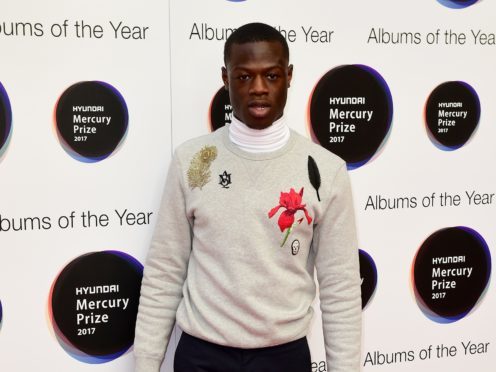 J Hus has been charged with knife possession (Ian West/PA)