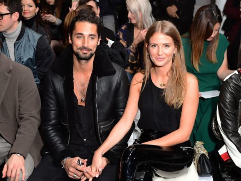 Hugo Taylor and Millie Mackintosh on the front row during the Blood Brother London Fashion Week Men’s AW18 show held at BFC Show Space, London (Ian West/PA)