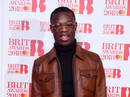 J Hus denies having a lock knife, without good reason or lawful authority (Ian West/PA)