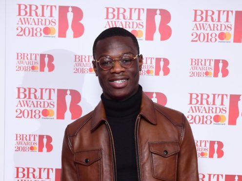 J Hus attending the Brit Awards 2018 Nominations event held at ITV Studios on Southbank, London (Ian West/PA Images)