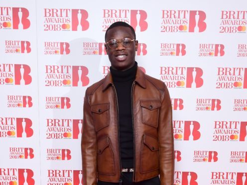 J Hus has been dropped from the bill (Ian West/PA)