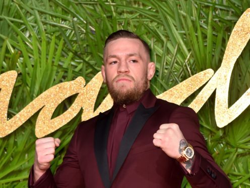 Conor McGregor’s girlfriend has revealed she is expecting their second child (Matt Crossick/PA)