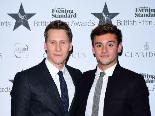 Tom Daley’s husband, Dustin Lance Black, took the couple’s newborn son to work with him (Ian West/PA)