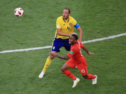 Sweden’s Andreas Granqvist (left) and England’s Raheem Sterling battle for the ball (PA)