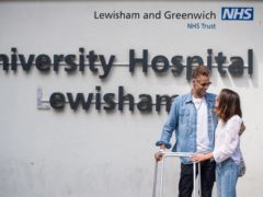 Former BBC TV Blue Peter presenter Richard Bacon leaves Lewisham Hospital in south east London with his wife Rebecca.