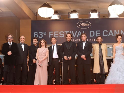 Alberto Barbera, second left, arrives for the official Robin Hood screening at the Cannes Film Festival (Ian West/PA)