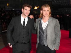 Liam (left) and Chris Hemsworth (right) at the premiere of The Hunger Games in London (Ian West/PA)