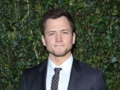 Taron Egerton has told fans his upcoming Robin Hood movie will be similar in tone to Peaky Blinders (Isabel Infantes/PA)