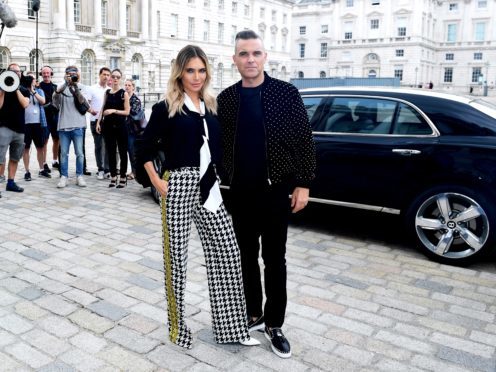 Robbie Williams and wife Ayda (Ian West/PA)