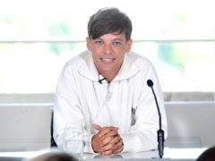 Louis Tomlinson said he has ‘grown up fast’ since appearing on The X Factor (Ian West/PA)