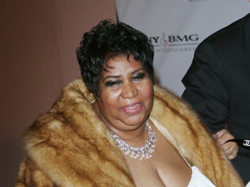 Flowers and pictures are placed on Aretha Franklin’s star at the Hollywood Walk of Fame (Marcio Jose Sanchez/AP)