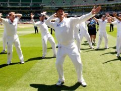 England’s Graeme Swann leads the team team in the Sprinkler dance in Melbourne (Gareth Copley/PA)