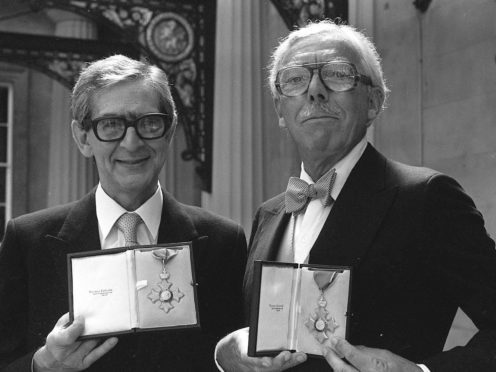 Comedy script writing partners Denis Norden and Frank Muir with their CBEs (PA)