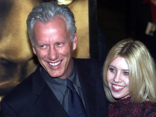 Actor James Woods with Dawn Denoon arrives for the premiere of his new movie “John Q” in Hollywood, California.