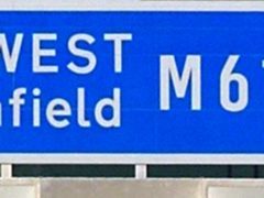A sign on Britain’s first toll motorway which will open to traffic Tuesday. The 900 million 27-mile M6 Toll north of Birmingham will be subject to a phased opening over a five-day period, and will initially be restricted to local motorists joining the route from Lichfield, Tamworth, Sutton Coldfield, Brownhills and Cannock.