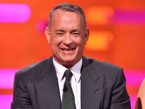 The first picture of Tom Hanks in his latest film role as a beloved children’s television host has been released (Matt Crossick/PA)