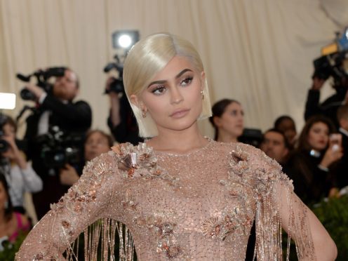Kylie Jenner shared an adorable video of her daughter Stormi standing up and dancing in her mother’s arms (PA Archive/PA Images)