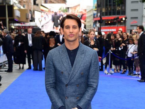 Ollie Locke has announced he is engaged to his partner Gareth (Ian West/PA)