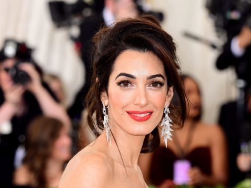 Amal Clooney has called for immediate pardons in the cases of two reporters jailed in Burma (Ian West/PA)